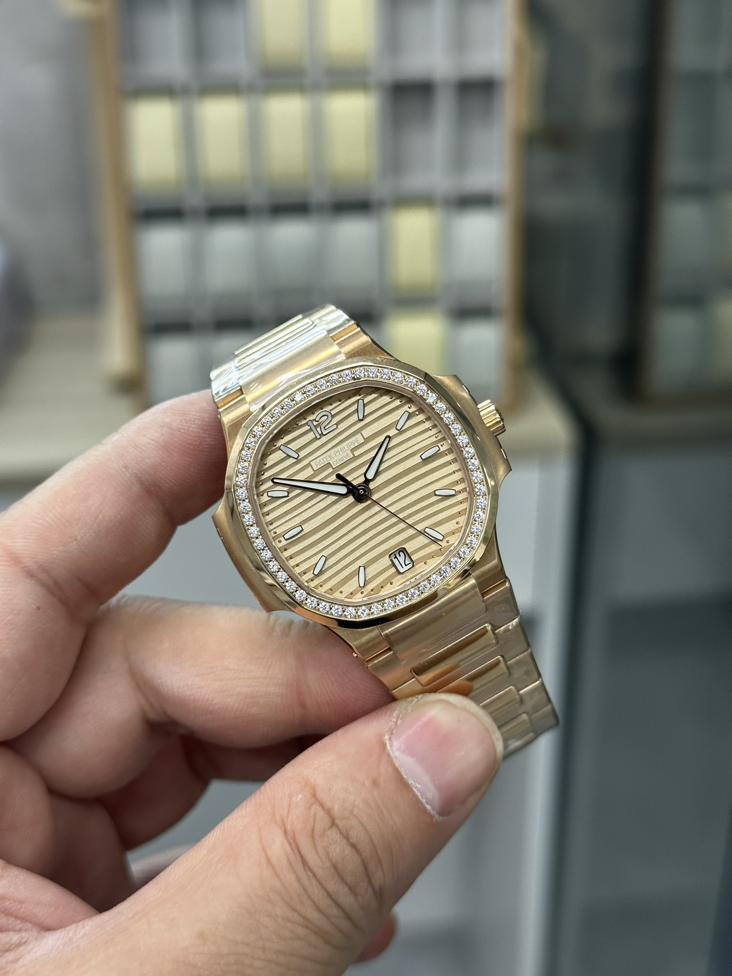 Patek Philippe Ladies Nautilus Golden Dial Rose Gold 7118 1200R 010