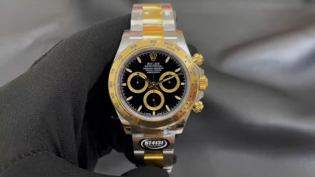 Wrist video view of the Rolex Cosmograph Daytona 126503 0003, black dial and gold bezel visible. - Video