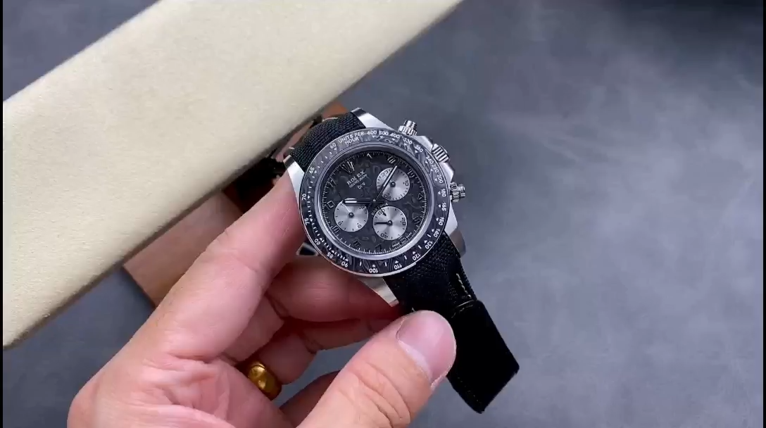 Rolex Daytona DIW 116500LN, hand-held video showing black nylon strap and dial. - Video