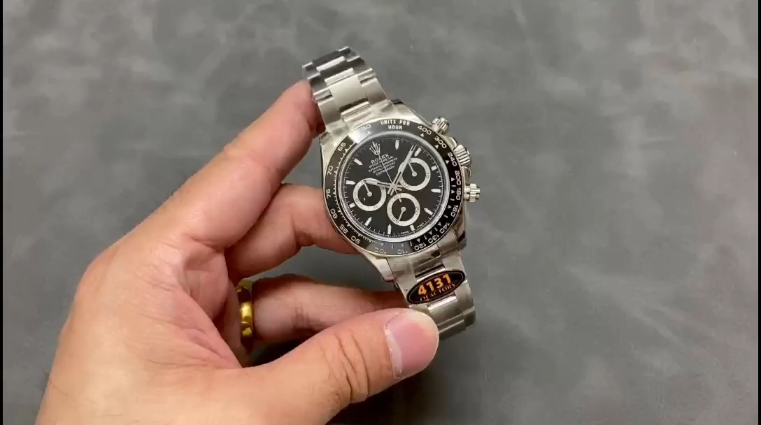 Rolex Daytona 116520 video, handheld view of black dial and bezel. - Video