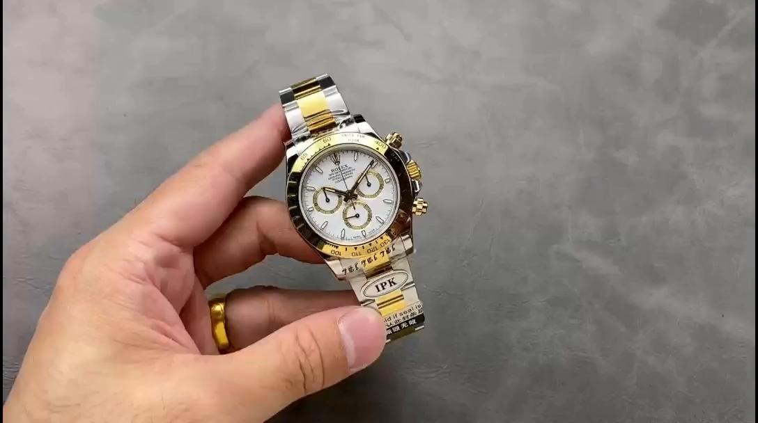 Rolex Daytona 126503 video, handheld view of white dial and two-tone bracelet. - Video