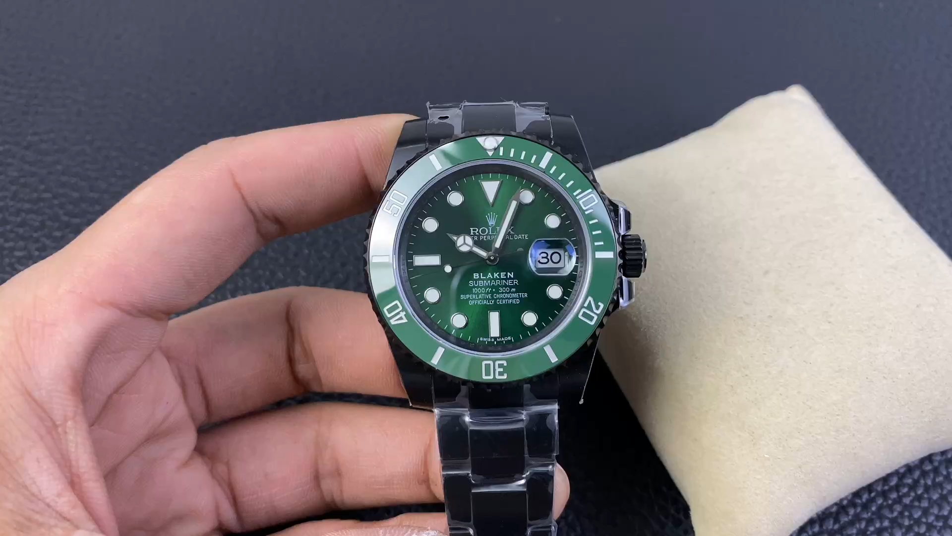 Video of Rolex Submariner 116610LV showing the green bezel and black bracelet. - Video