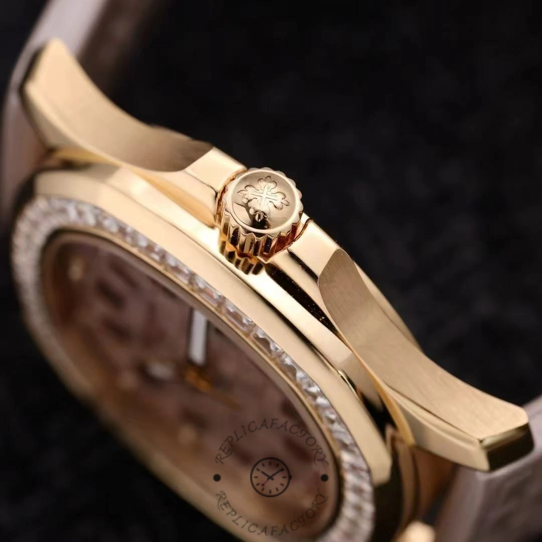 Crown-side close-up of Patek Philippe Aquanaut 5072R-001 showing case thickness and bezel setting.