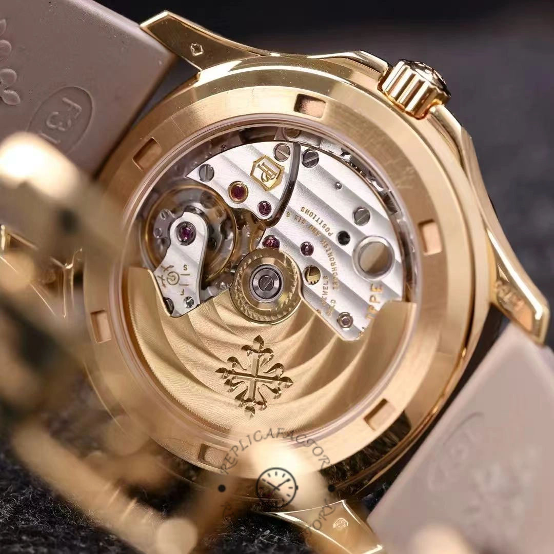 Exhibition caseback of Patek Philippe Aquanaut 5072R-001 showing gold rotor and movement finishing.