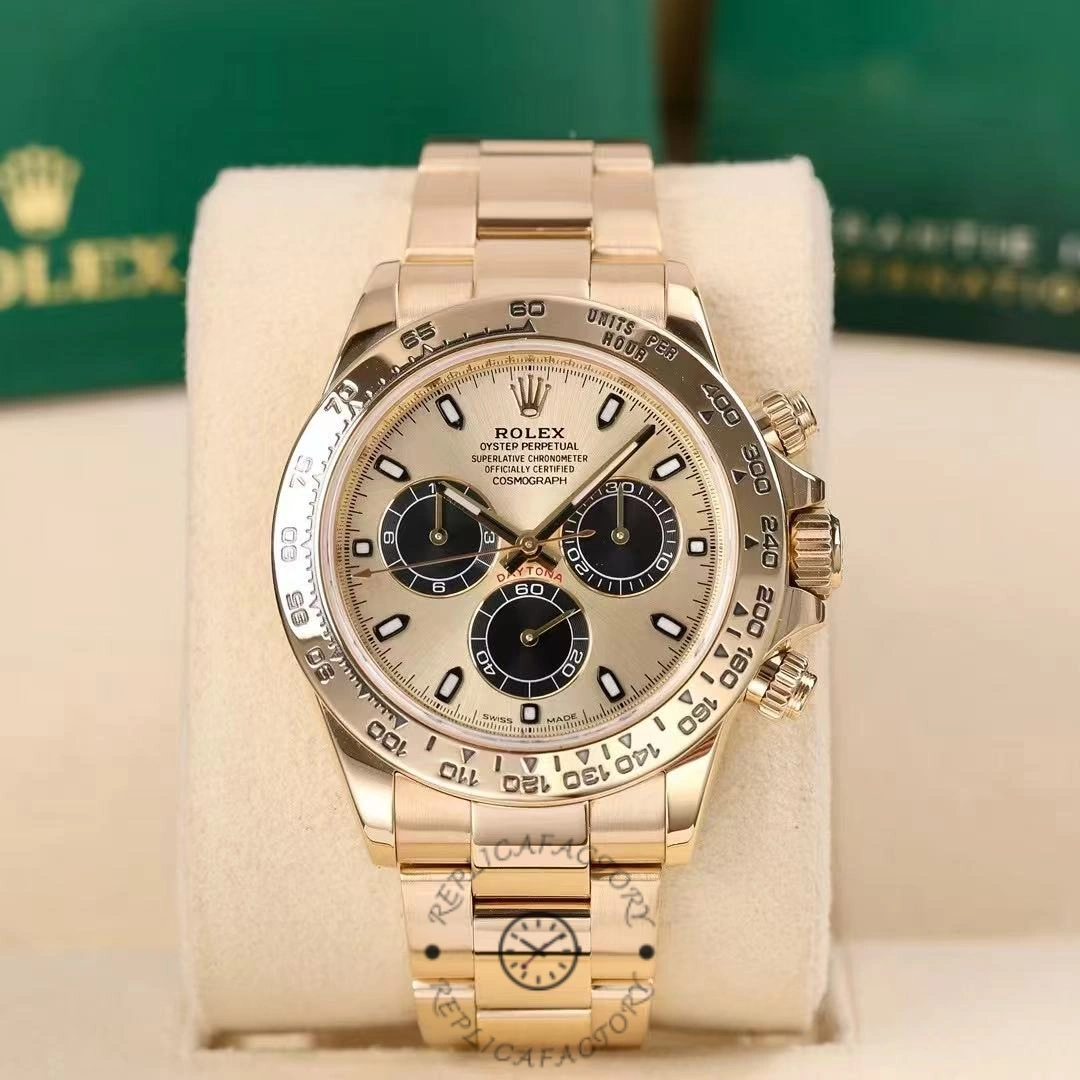 Display view of Rolex Daytona 116508 on cushion, champagne dial and gold bracelet.
