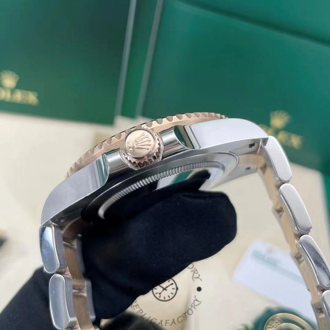 Side view of Rolex GMT-Master II 126711CHNR, showing case profile and bezel edge.