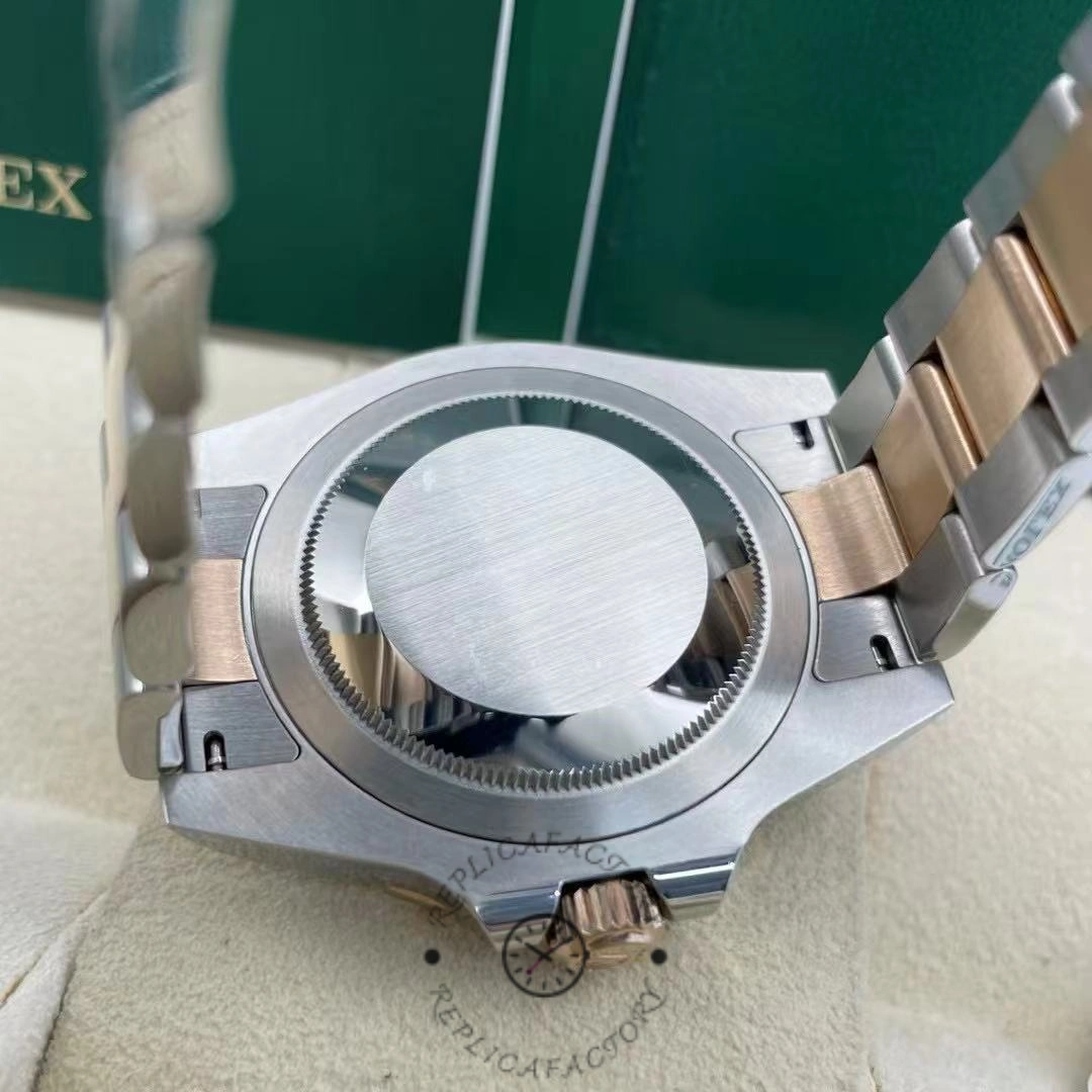 Caseback view of Rolex GMT-Master II 126711CHNR, solid back and bracelet end links.