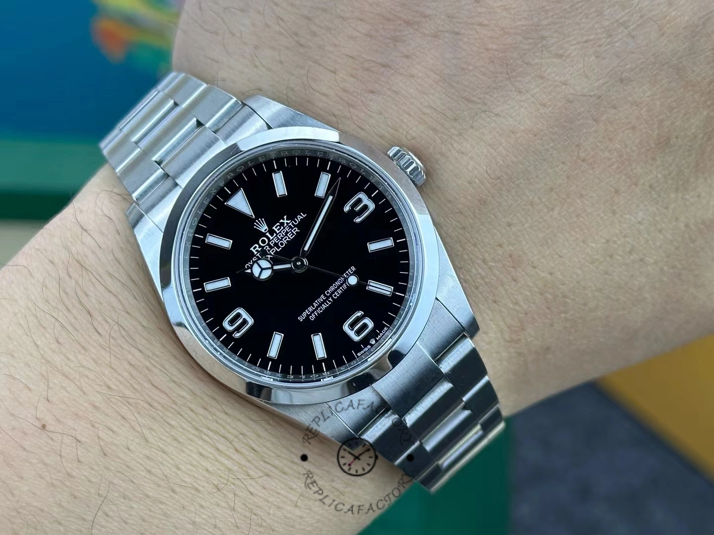 Rolex Explorer 124270 0001, wrist shot showing 36mm fit and black dial.