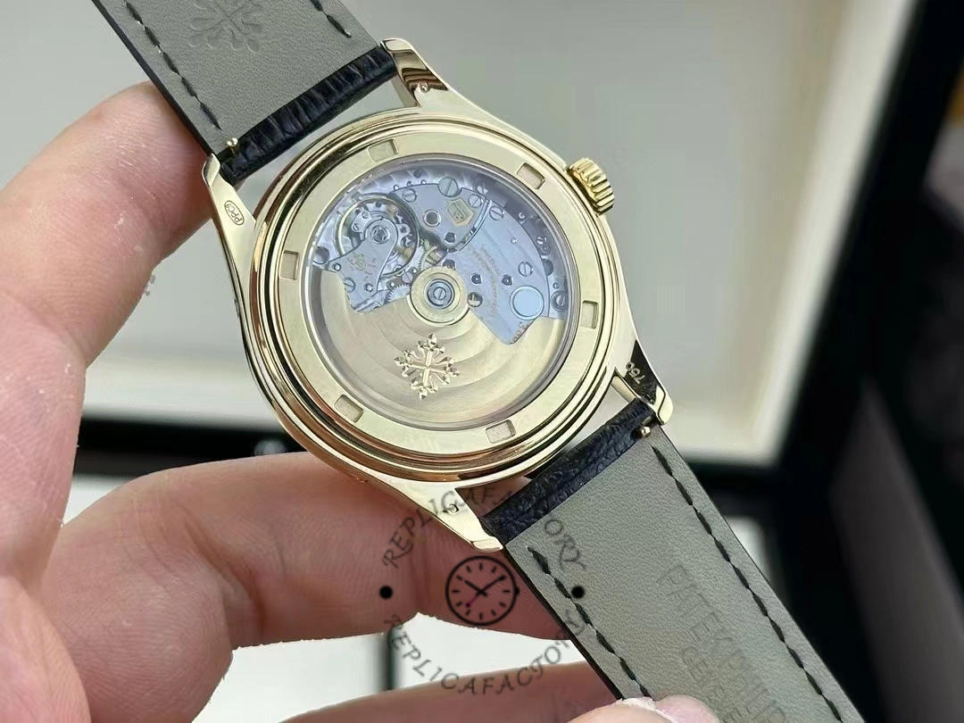Caseback view of the Patek Philippe 5146R-001, exhibition back showing automatic movement rotor.