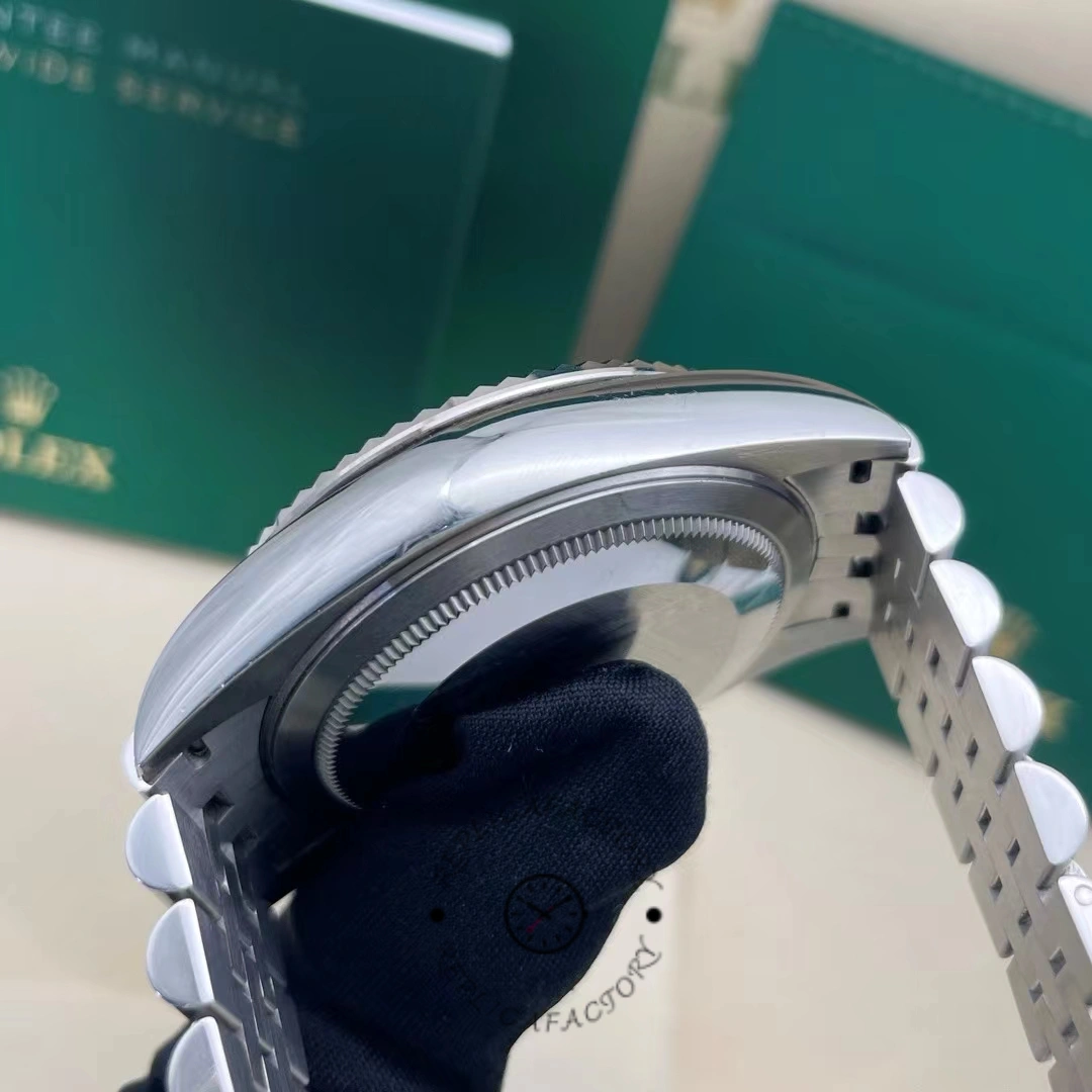 Side profile of Rolex Sky-Dweller m336934 0008, showing fluted bezel thickness and lugs.