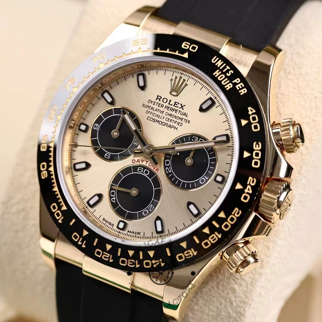 Close detail of Rolex Daytona 116518LN with champagne dial and engraved black tachymeter bezel.