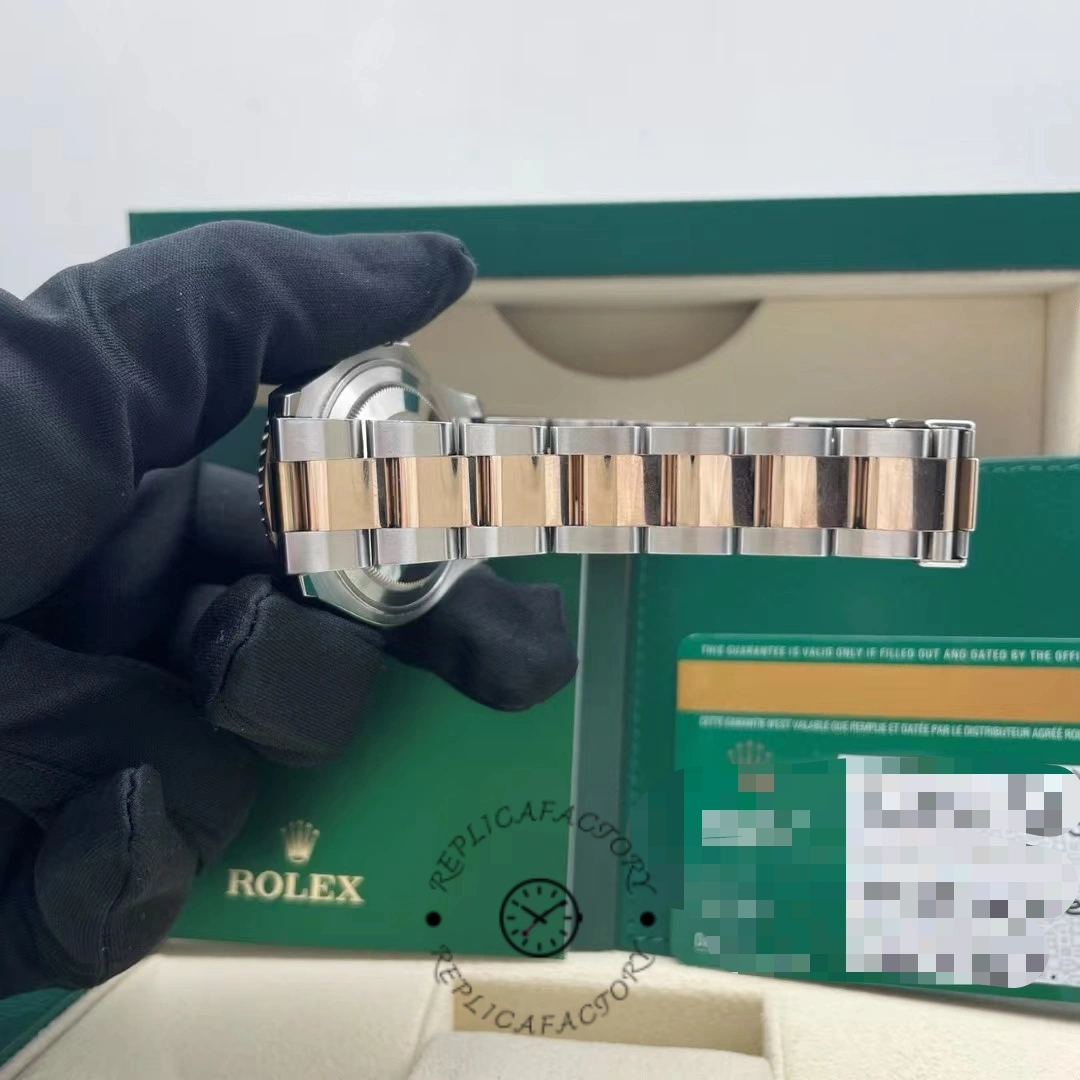 Rolex Yacht-Master 268621 bracelet links view, Everose center links and clasp, in glove.