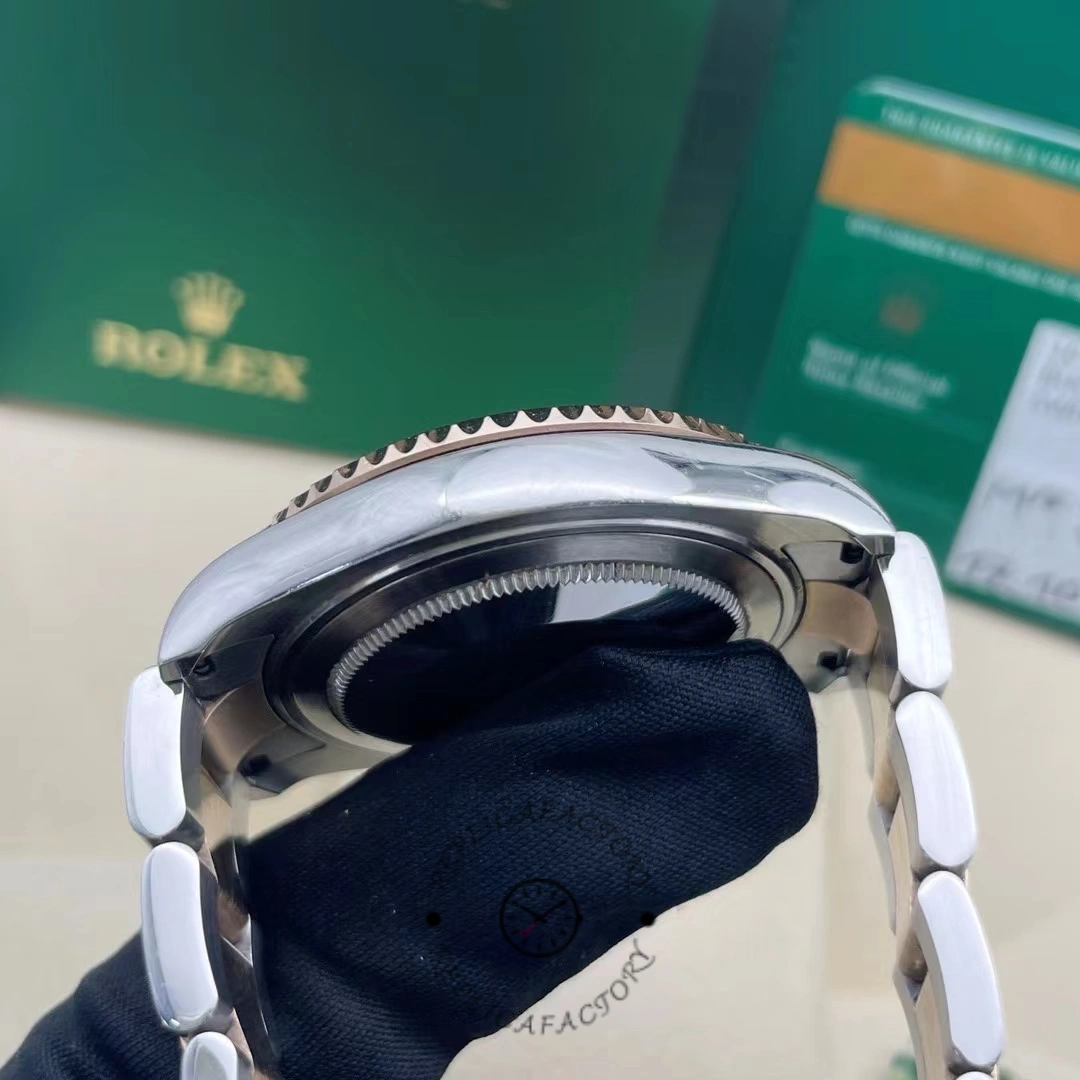 Rolex Yacht-Master 268621 side profile on glove, case thickness and bezel edge detail.