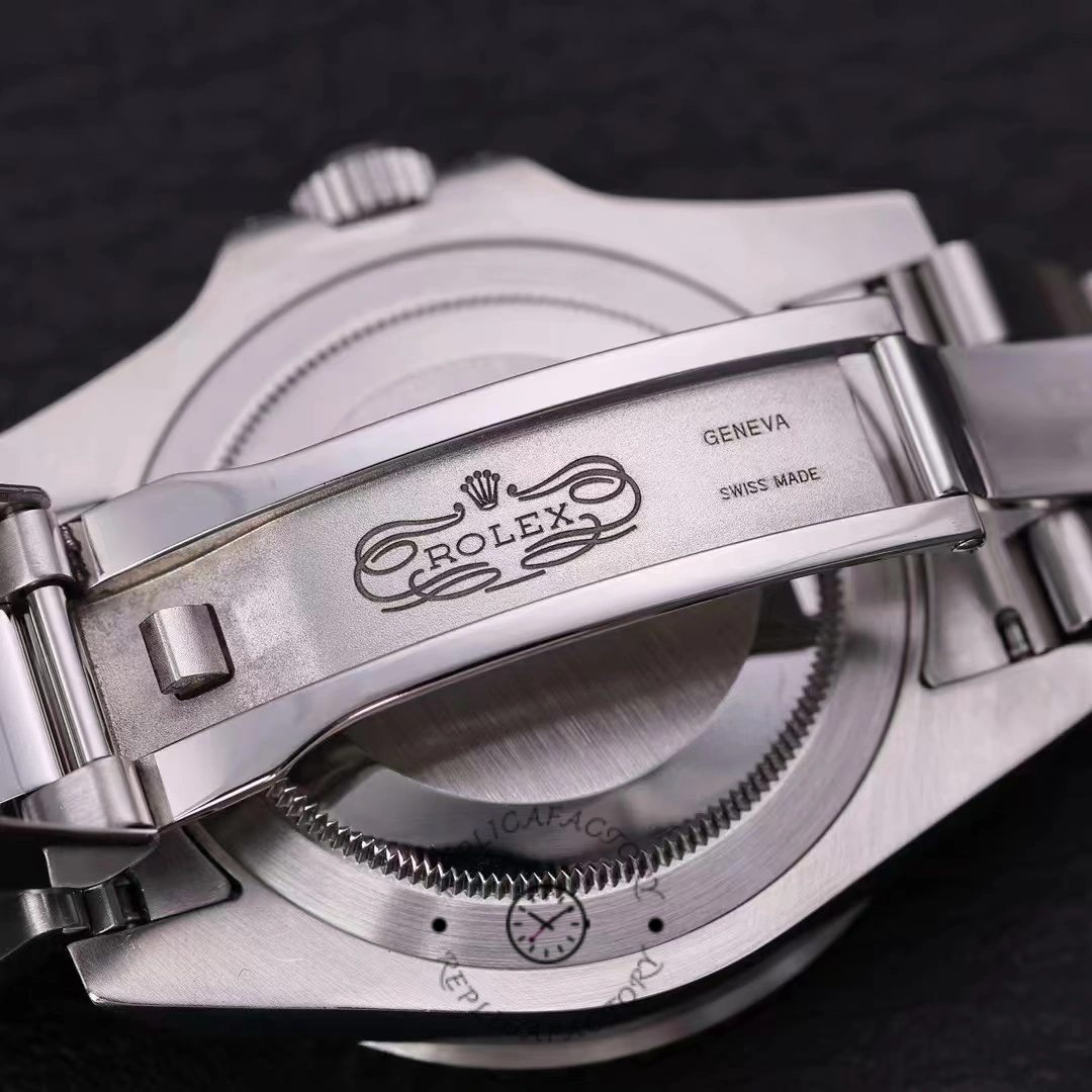 Rolex GMT-Master II 126710BLRO clasp close-up, Oyster clasp engraving and links detail.