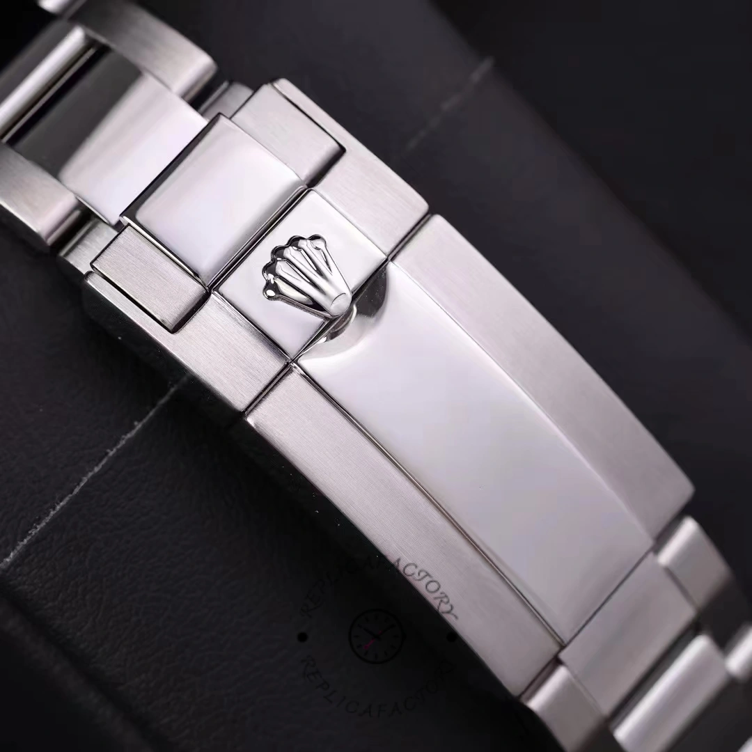 Rolex GMT-Master II 126710BLRO bracelet close-up, Rolex coronet on clasp, macro view.