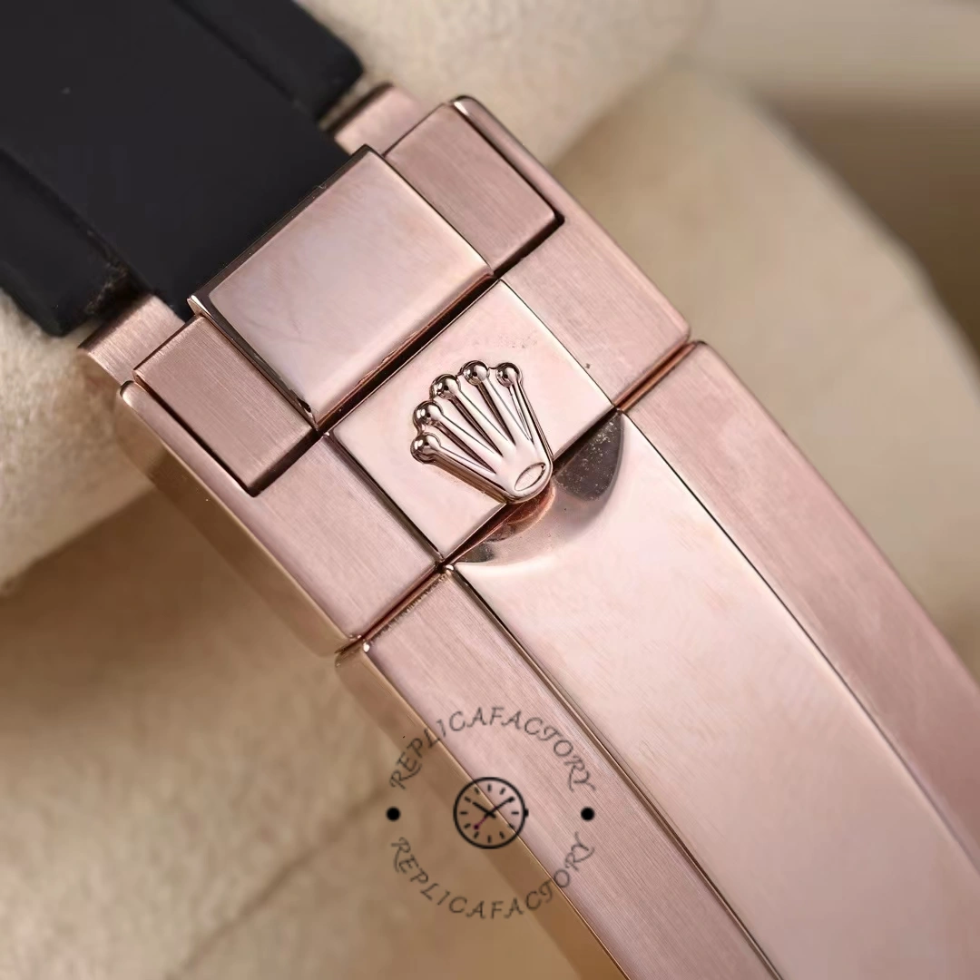 Rolex Yacht-Master 126655 clasp close-up, Everose clasp and strap connection detail.