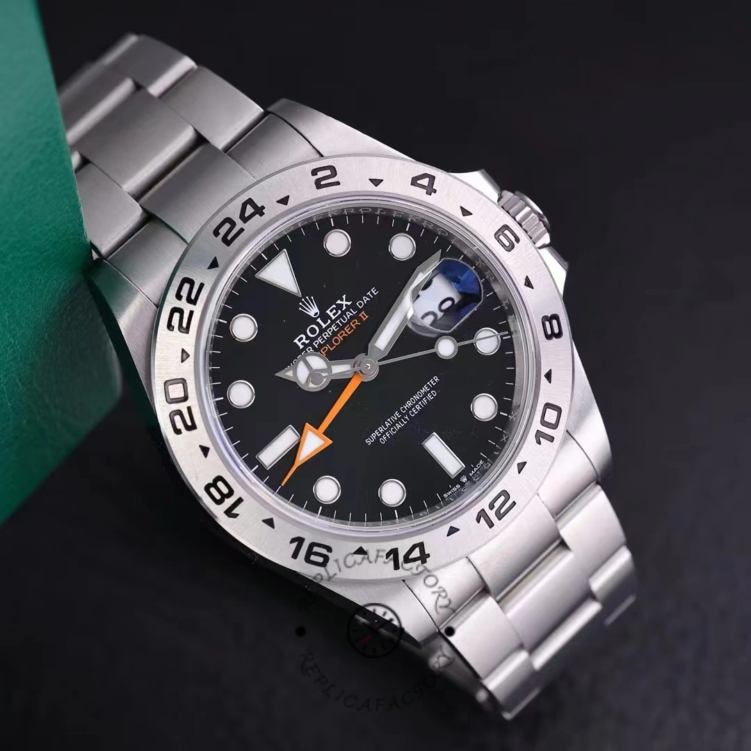Rolex Explorer II m226570 0002 studio shot, black dial and bezel, stainless steel bracelet.