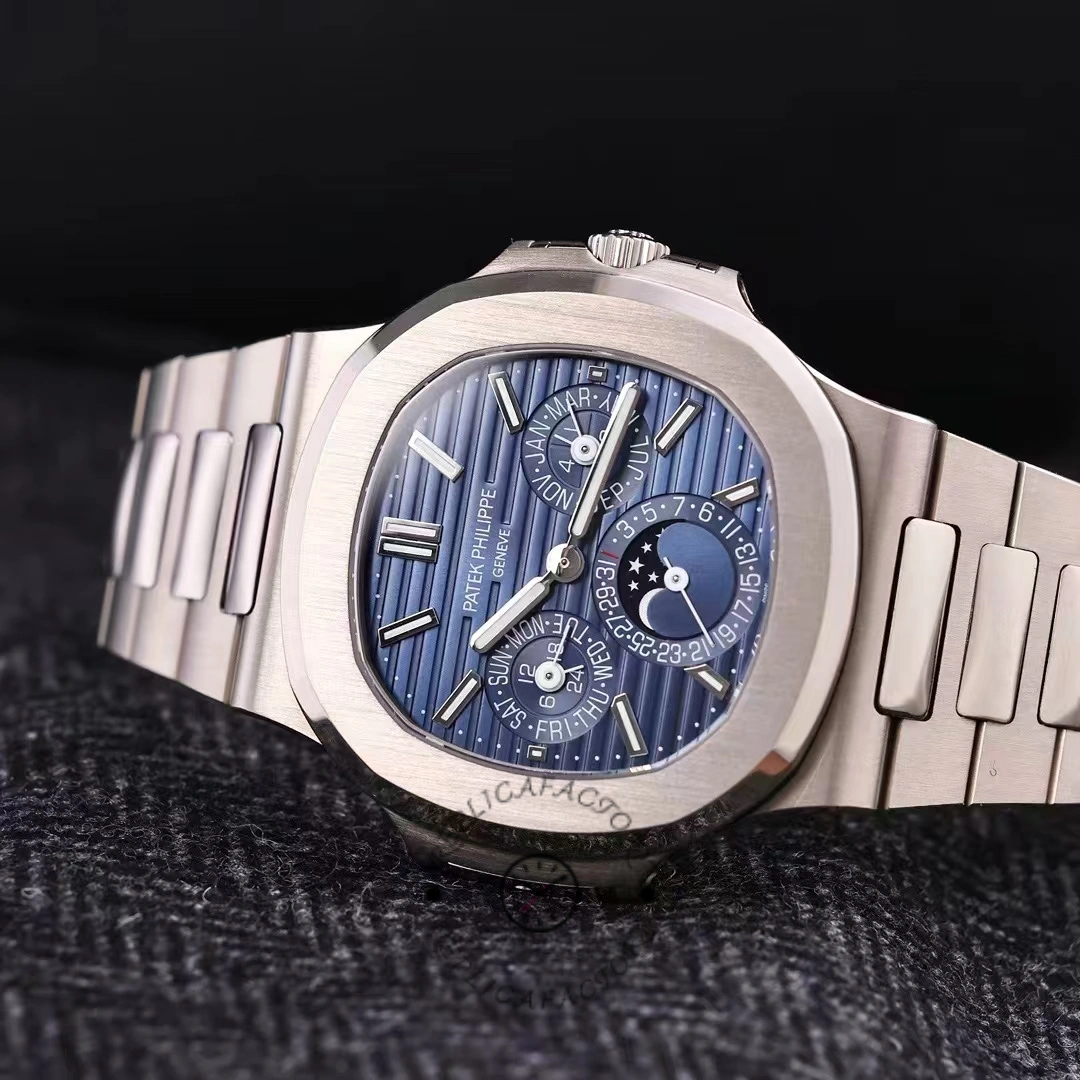 Side angle of the Patek Philippe Nautilus 5740 1G 001 emphasizing the slim case profile and bezel.