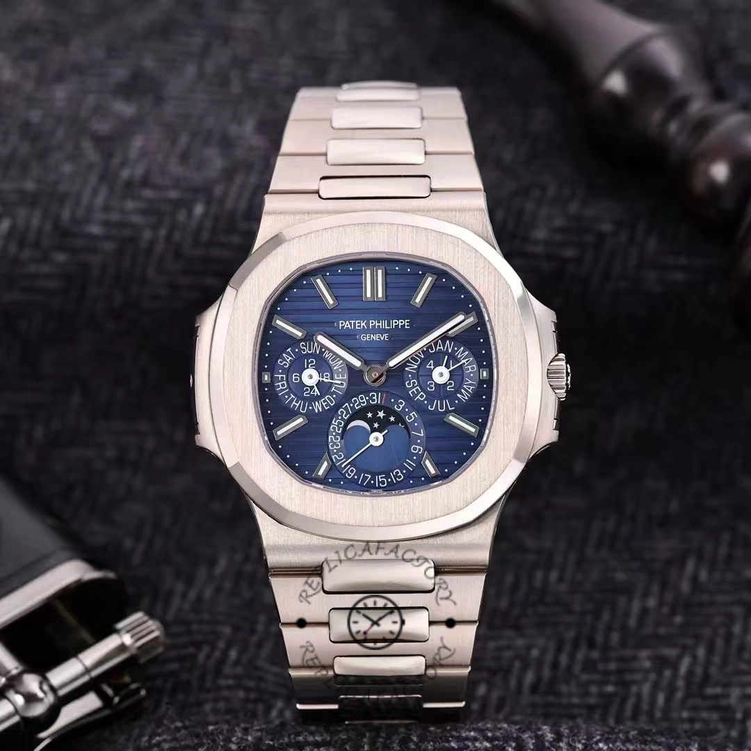 Patek Philippe Nautilus 5740 1G 001 on wrist, blue dial and white-gold case in natural light.