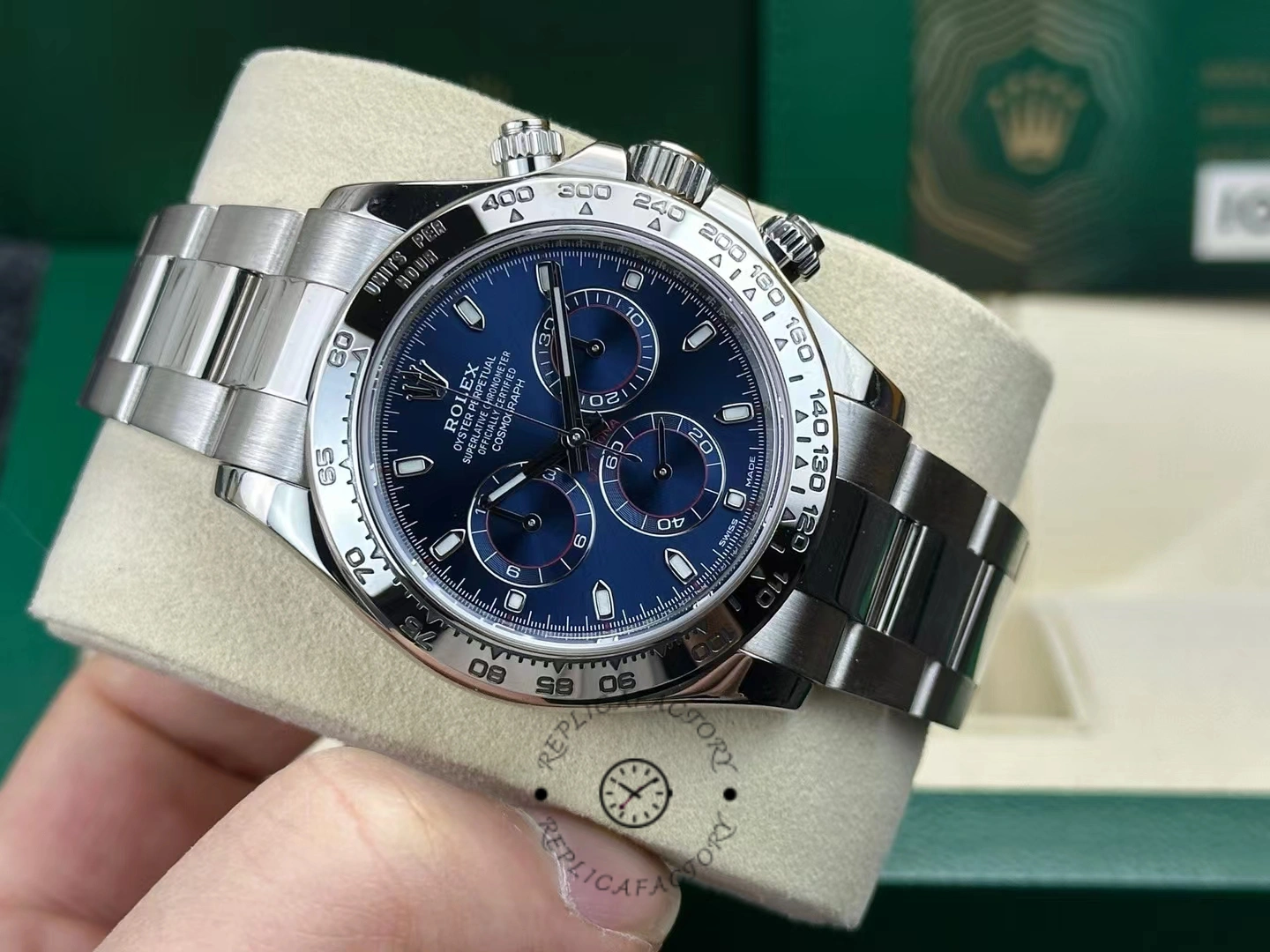 Front cushion view of the Rolex Cosmograph Daytona 116509 40MM showing blue dial and markers.