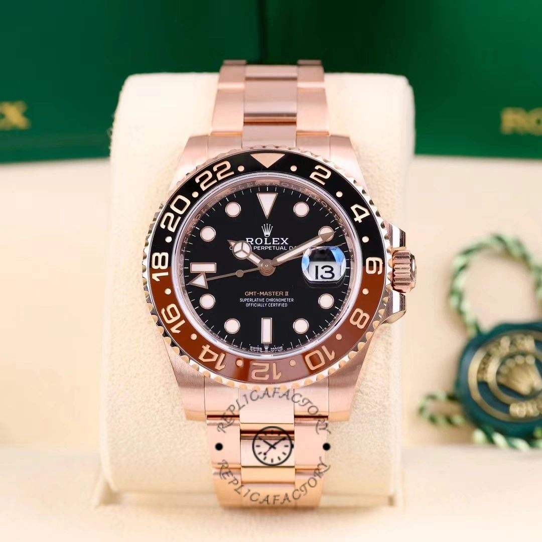 Rolex GMT-Master II 126715CHNR on display cushion, full front view with black dial and CHNR bezel.