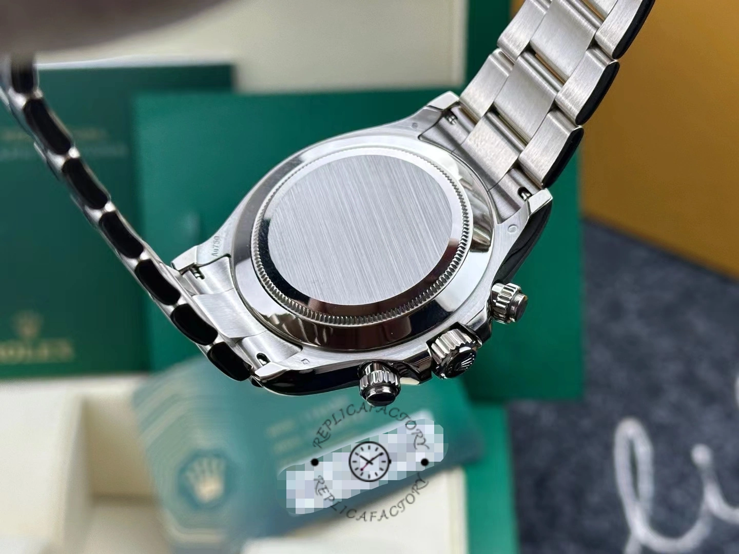 Case back view of the Rolex Cosmograph Daytona 116509 40MM on box, solid back shown.