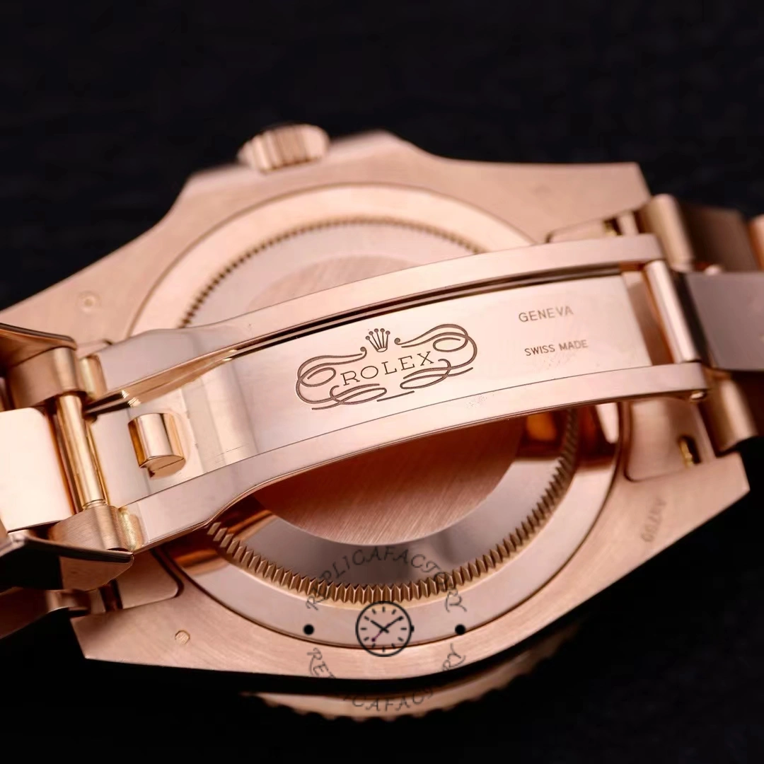 Clasp interior view of Rolex GMT-Master II 126715CHNR with folding mechanism visible.