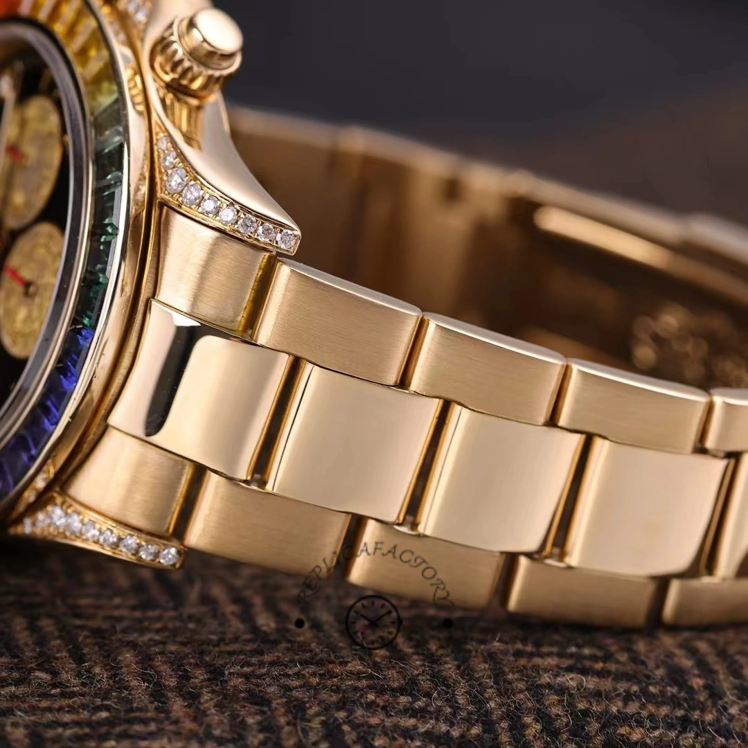Bracelet side view of Rolex Daytona 116528 showing polished gold links and finish.