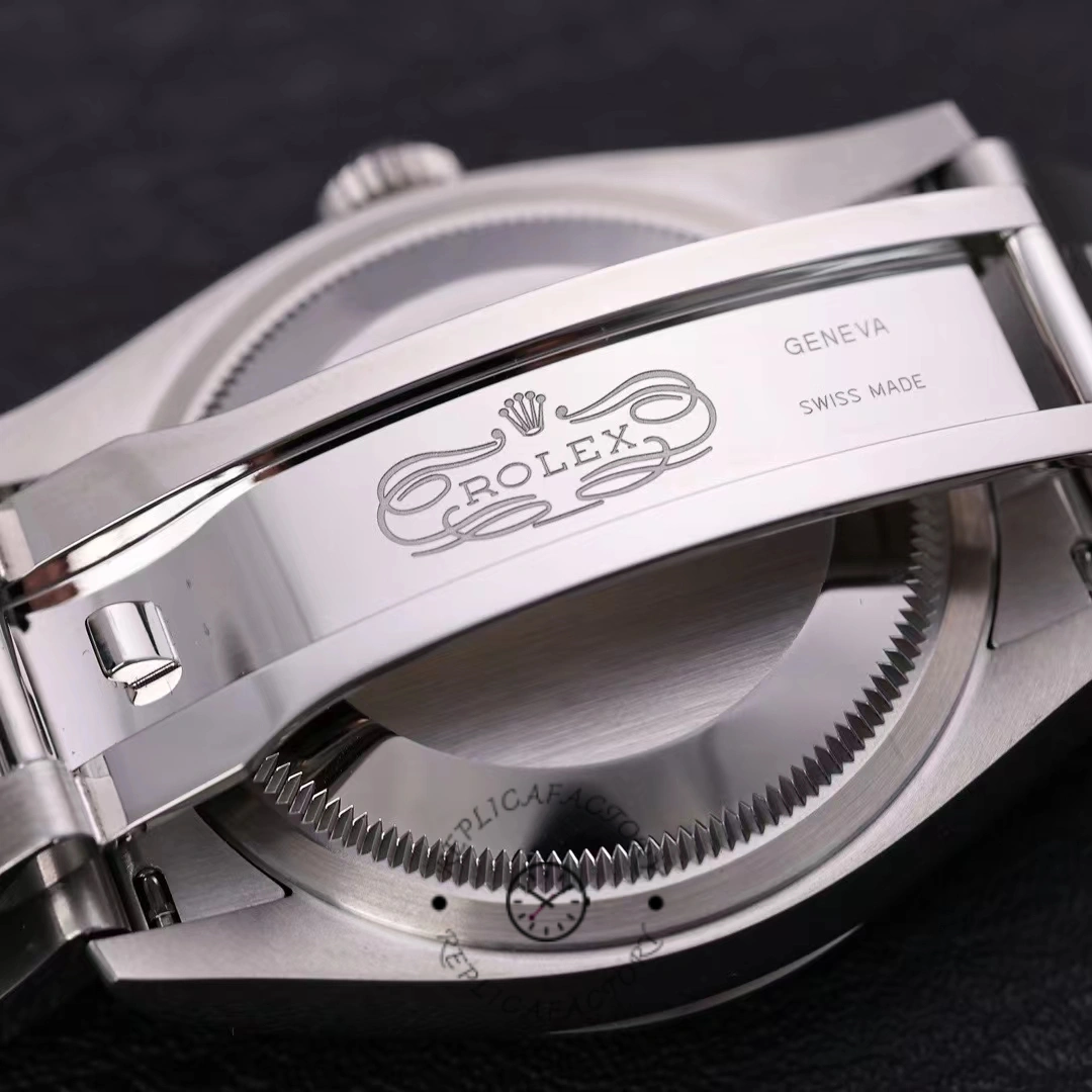 Rolex Oyster Perpetual 36 126000, clasp underside close-up showing folding clasp engraving.