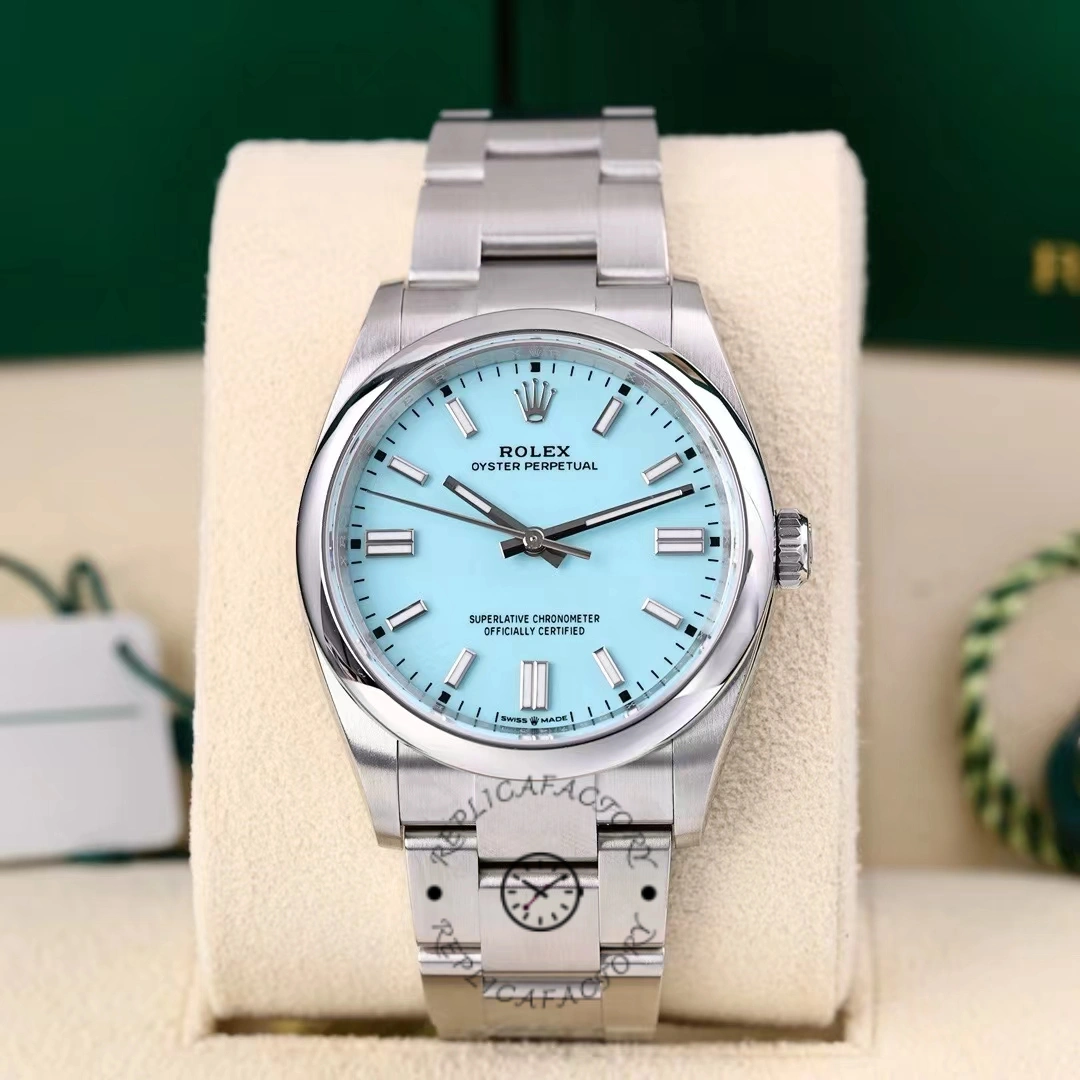 Rolex Oyster Perpetual 36 126000, front view in box showing baby blue dial and bracelet.