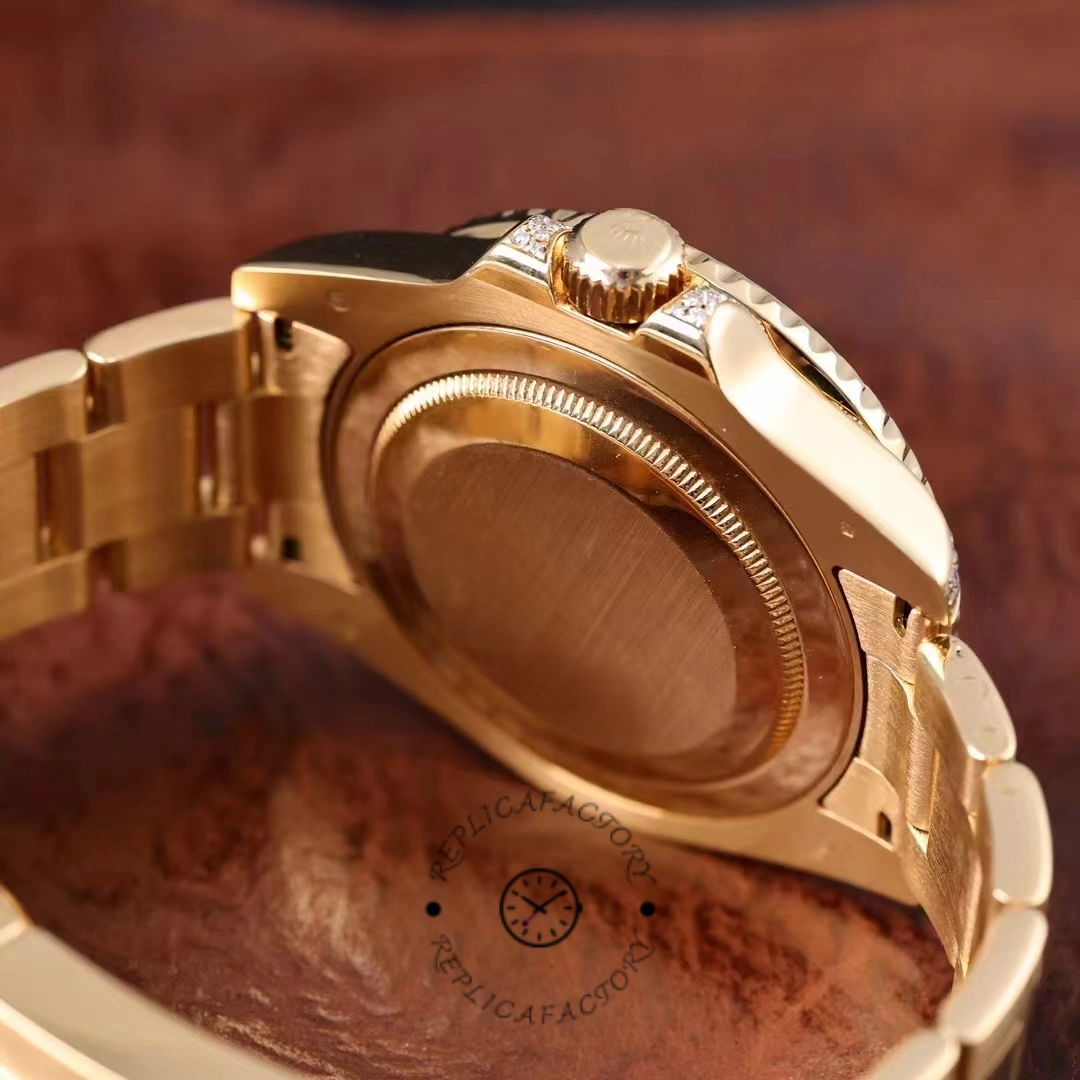 Rolex GMT-Master II 116758 case back view, yellow gold back and Oyster bracelet, rear angle.