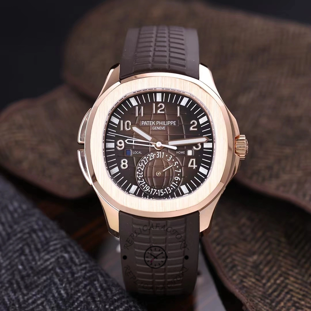 Hand-held front shot of the Patek Philippe Aquanaut 5164R-001 showing the brown dial and luminous hands.