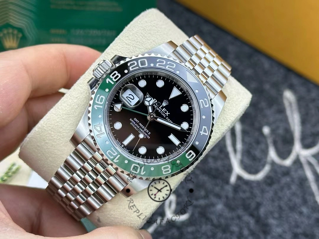 Angled view of the Rolex GMT-Master II 126720VTNR in hand, dial and bezel details visible.
