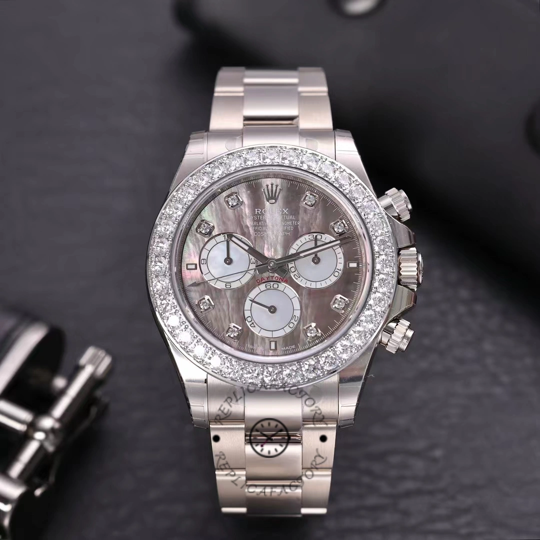 Rolex Daytona M126579RBR-0001, diamond bezel and chronograph subdials shown.