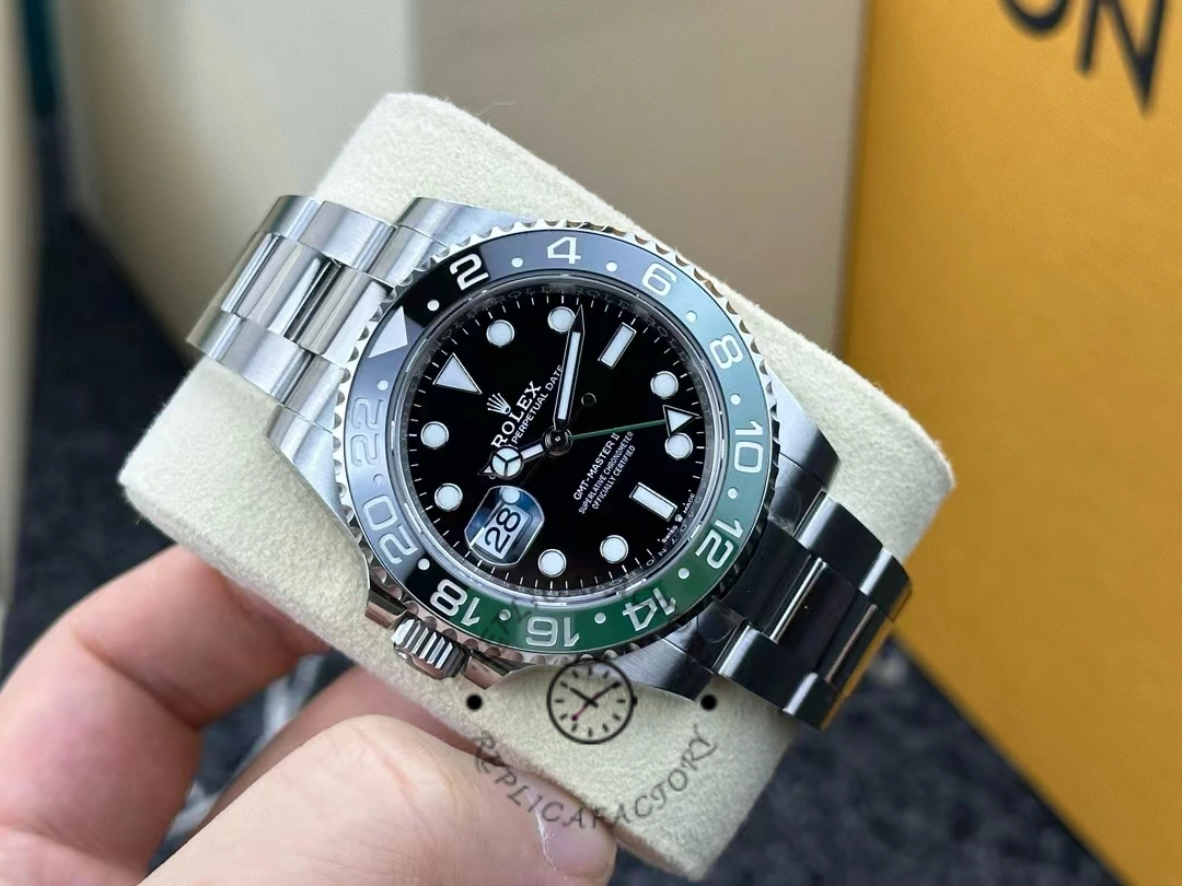 Close angled view of Rolex GMT-Master II 126720VTNR on cushion showing bezel and lugs.