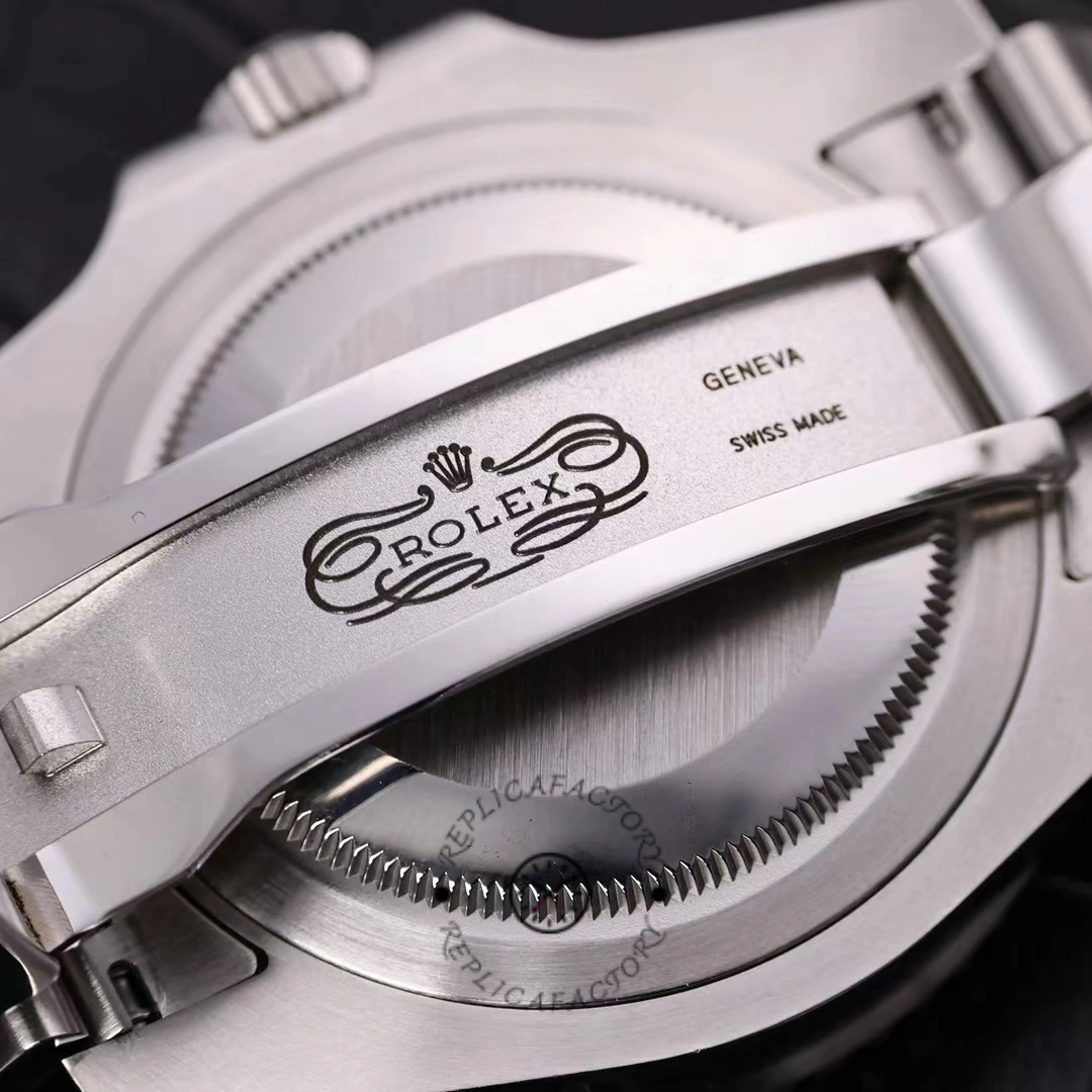 Rolex GMT-Master II 116710LN, clasp interior close-up showing folding clasp engraving.