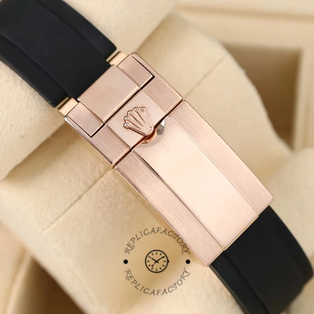 Clasp detail of the Rolex Yacht-Master 116695SATS showing buckle and strap finish.