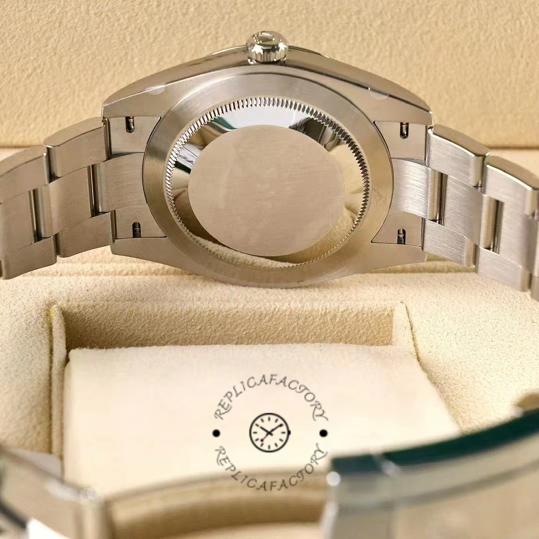 Rolex Oyster Perpetual 41 m124300 0006, caseback view on cushion showing solid back.