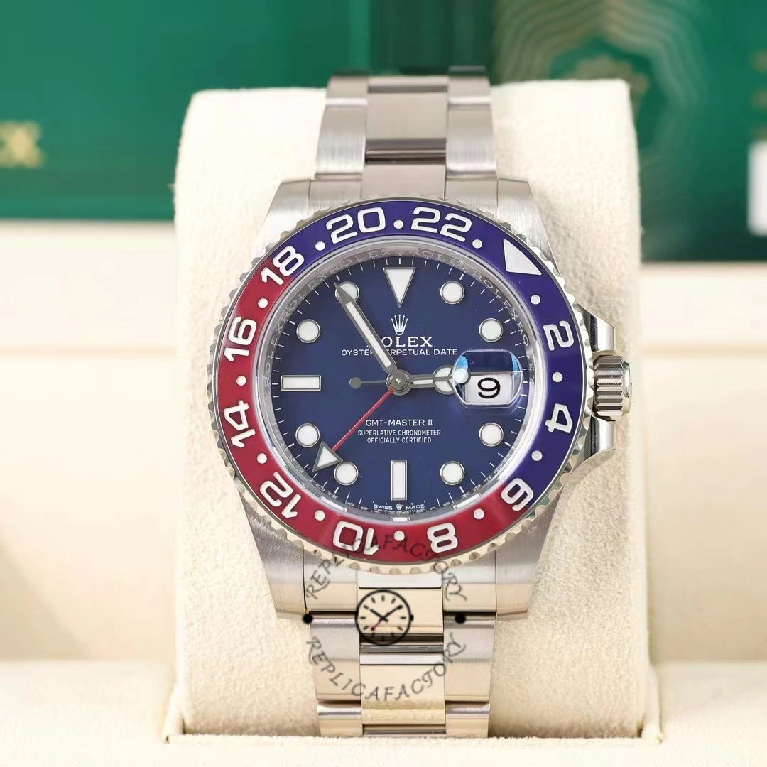 Rolex GMT-Master II 126719BLRO on display cushion, full front view with blue dial and BLRO bezel.