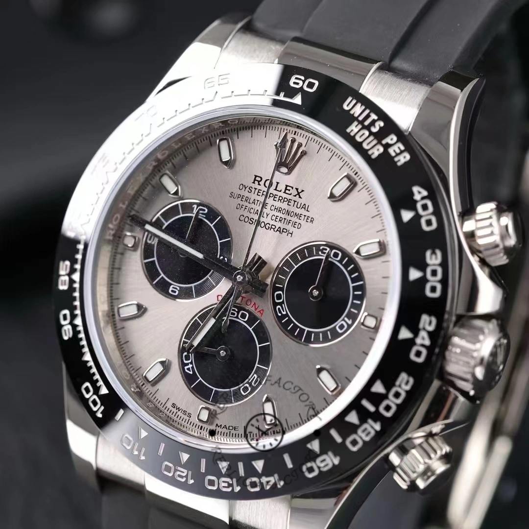 Rolex Daytona 116519 dial close-up, grey dial, black tachymeter bezel and markers.