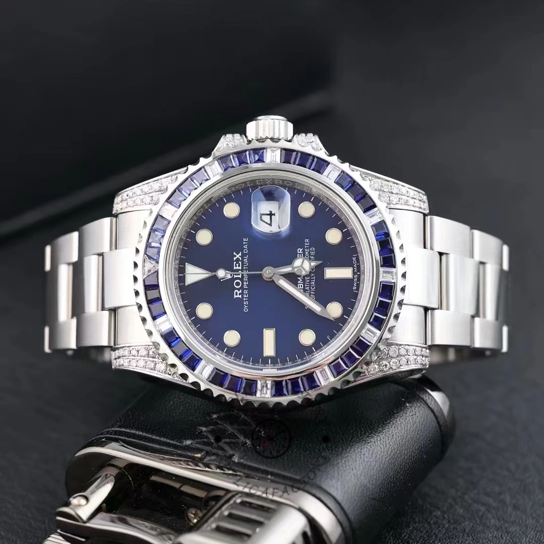 Rolex Submariner Date 116610LN, blue dial diamond bezel, full watch close-up on black.