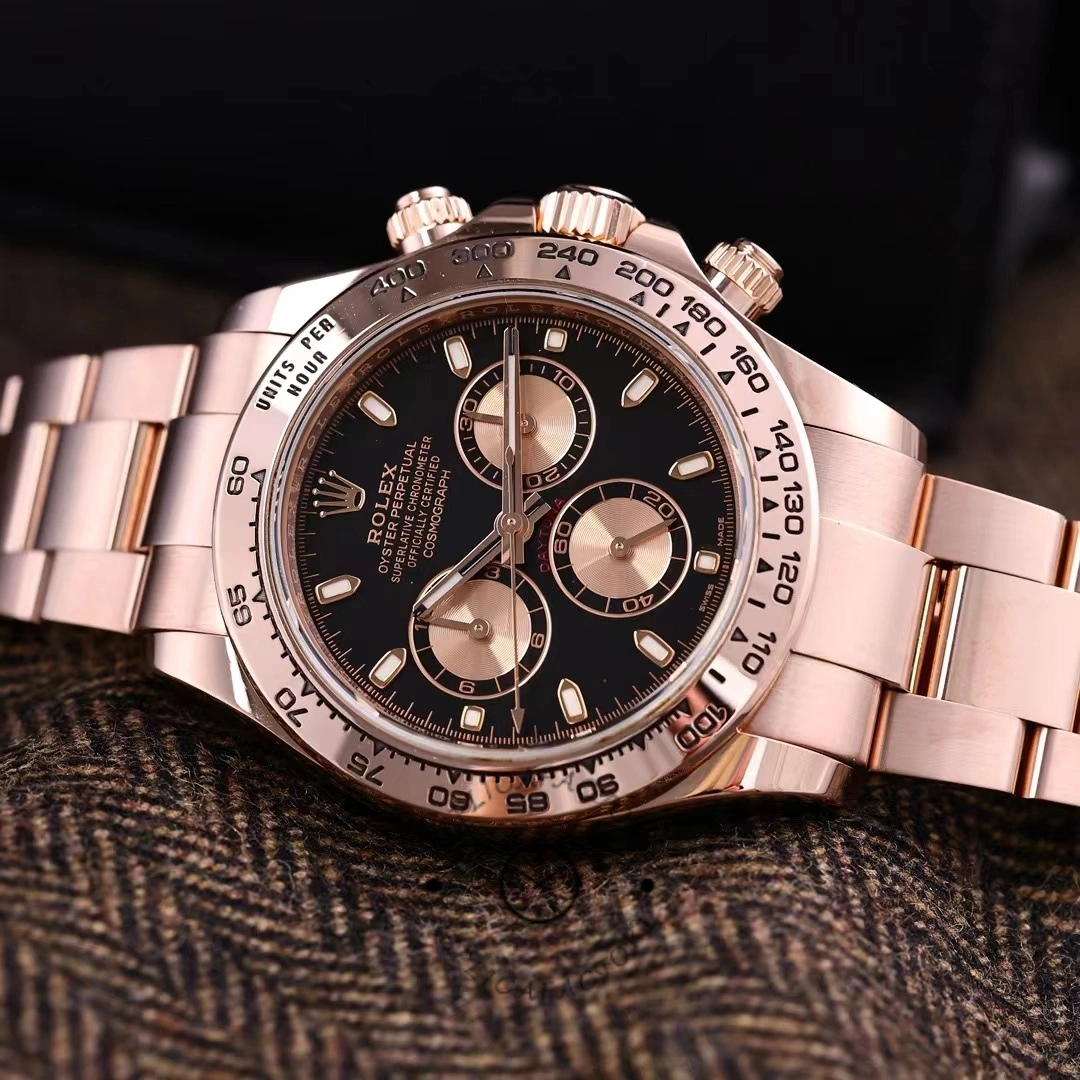 Three-quarter view of Rolex Daytona 116505, rose gold bracelet links and black dial details.