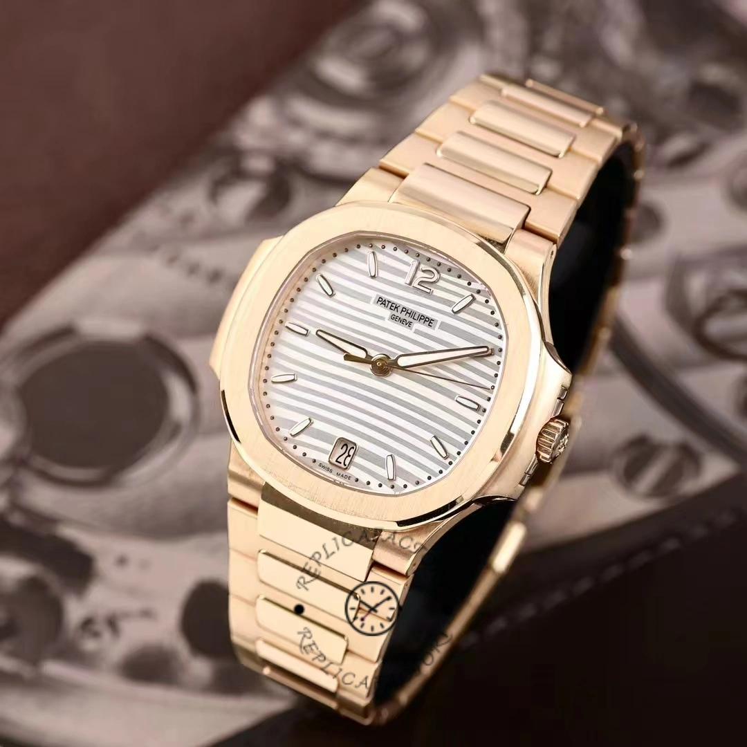 Patek Philippe Nautilus Ladies Rose Gold & Yellow Gold Silver Dial 7118 1R 001 35.2mm
