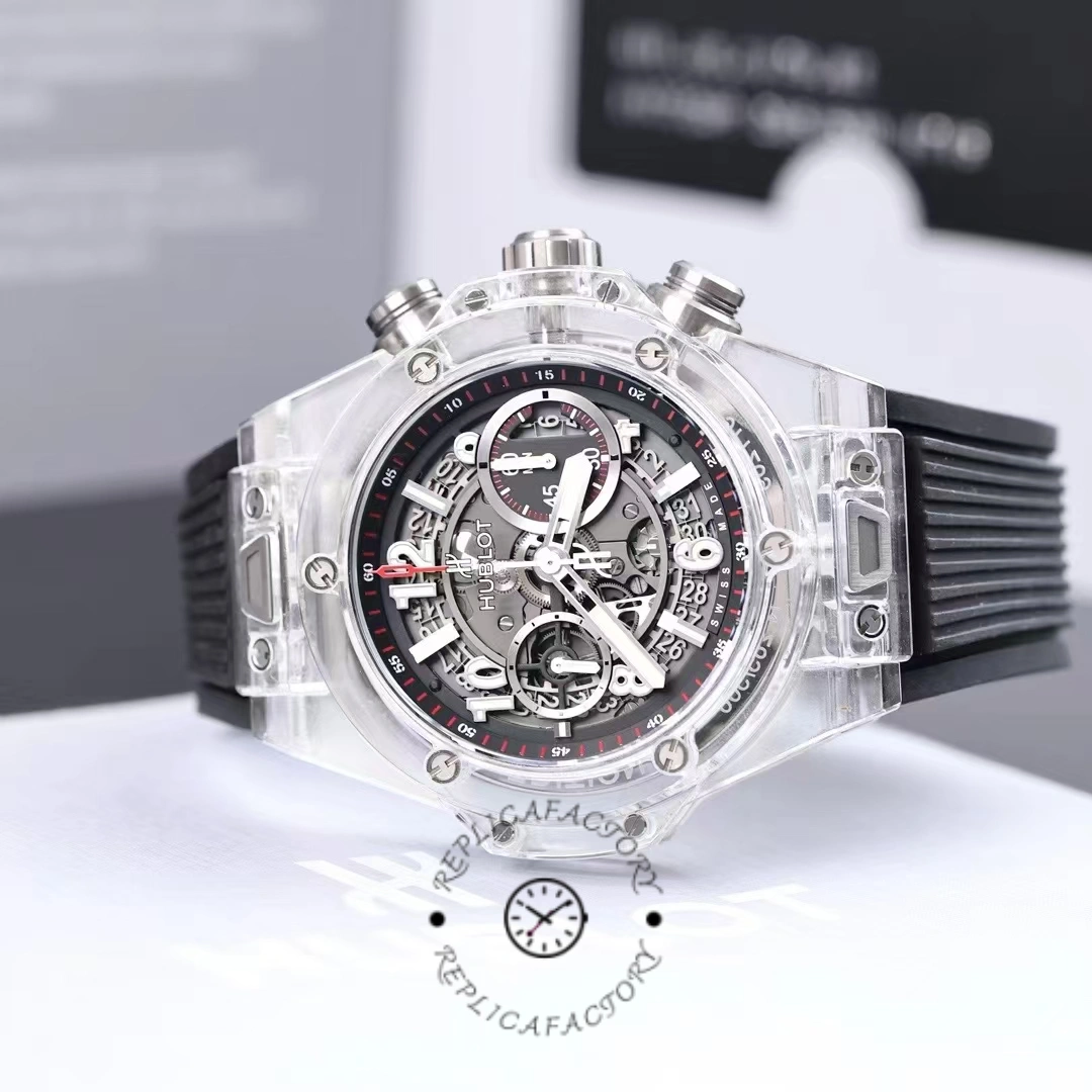 The Hublot Big Bang Unico 411.JX.1170.RX features a flat chronograph dial with sub-dials and a date window.