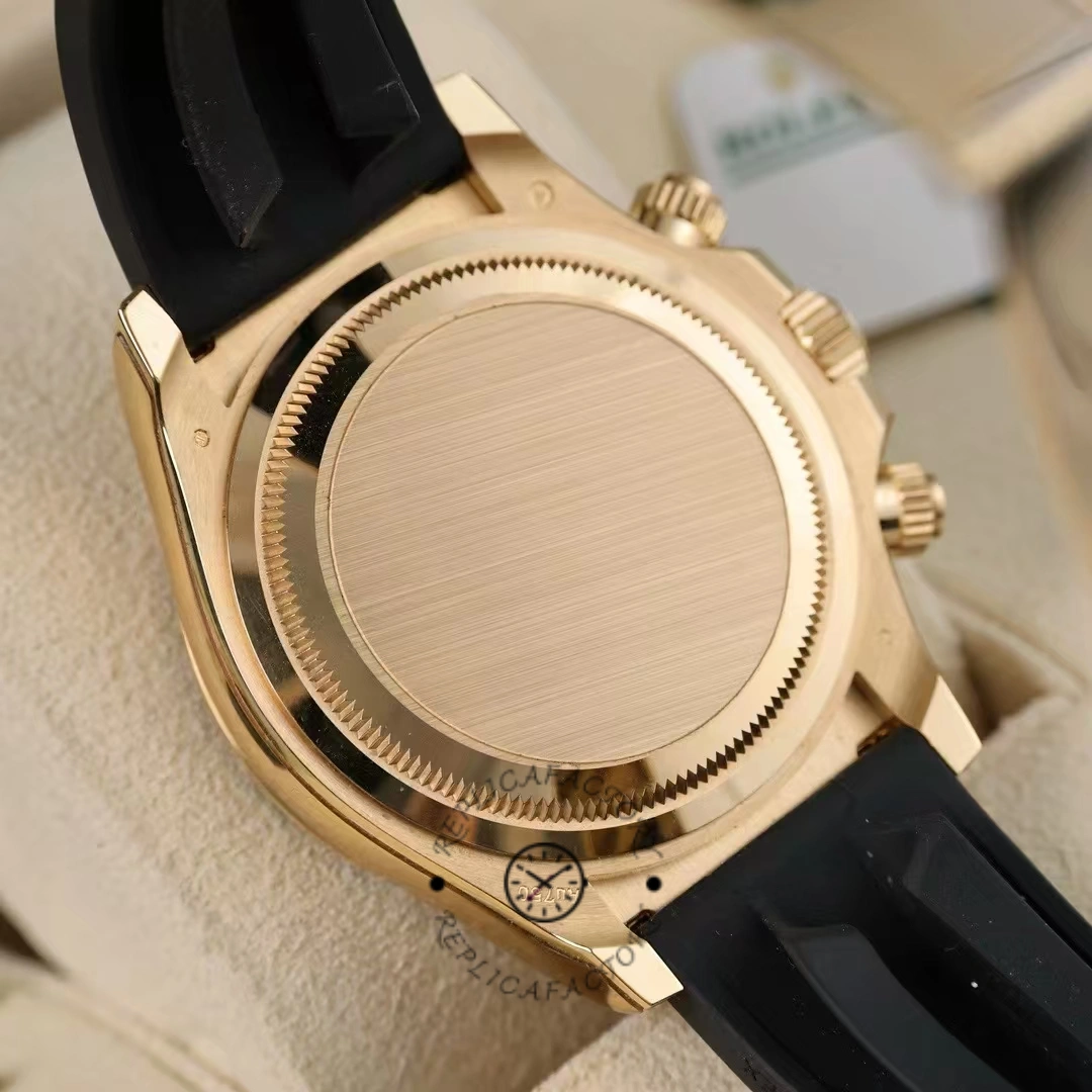 Rolex Daytona 126518LN case back view, yellow gold back and black Oysterflex strap.