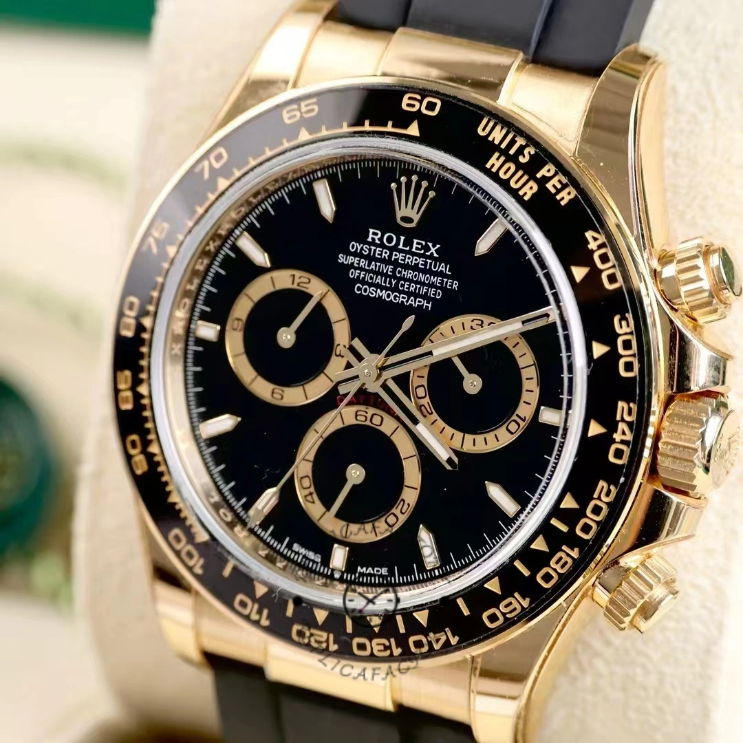 Rolex Daytona 126518LN close-up, black dial and chronograph subdials, gold case detail.