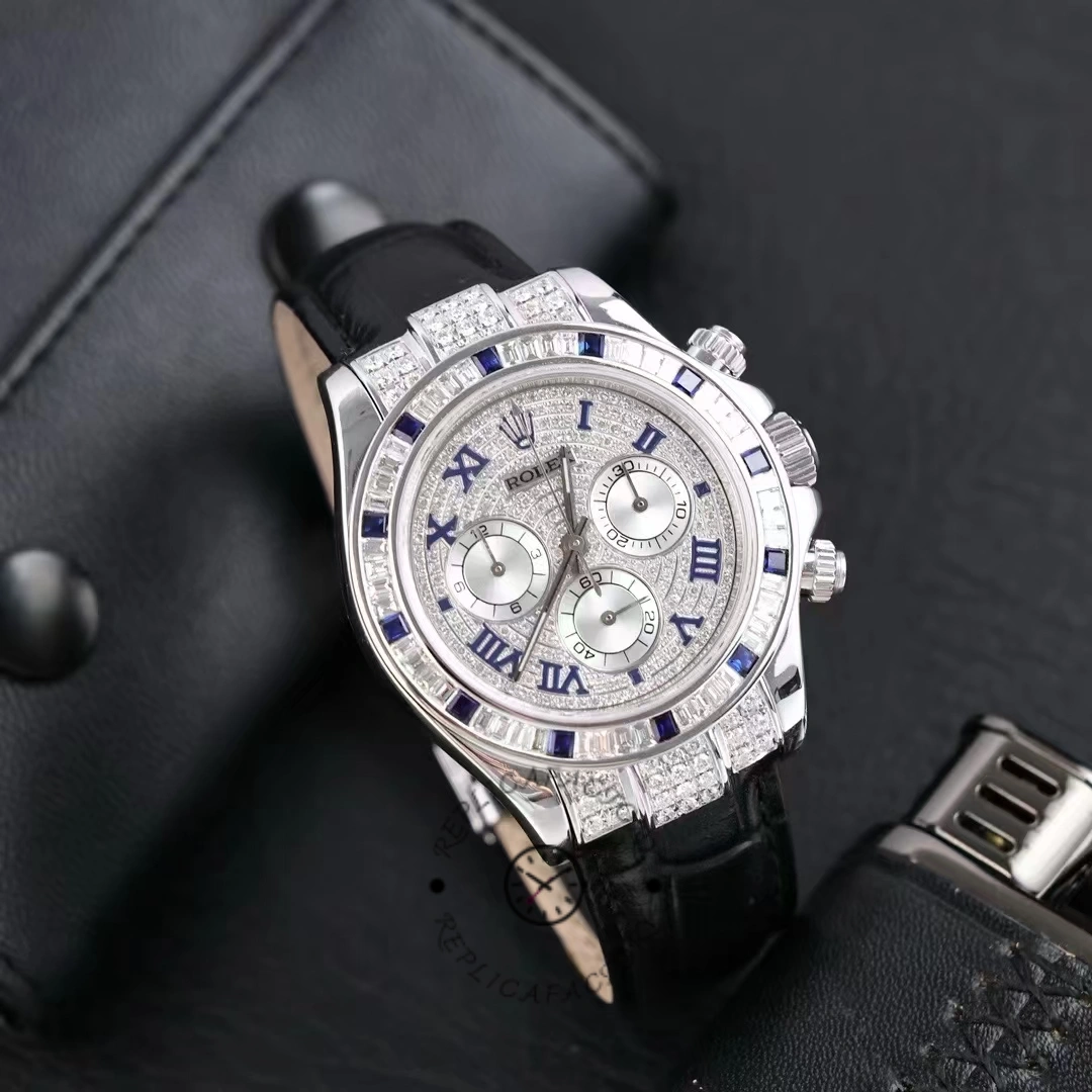 Angled view of Rolex Daytona 116599 showing diamond bezel and pave dial on blue strap.