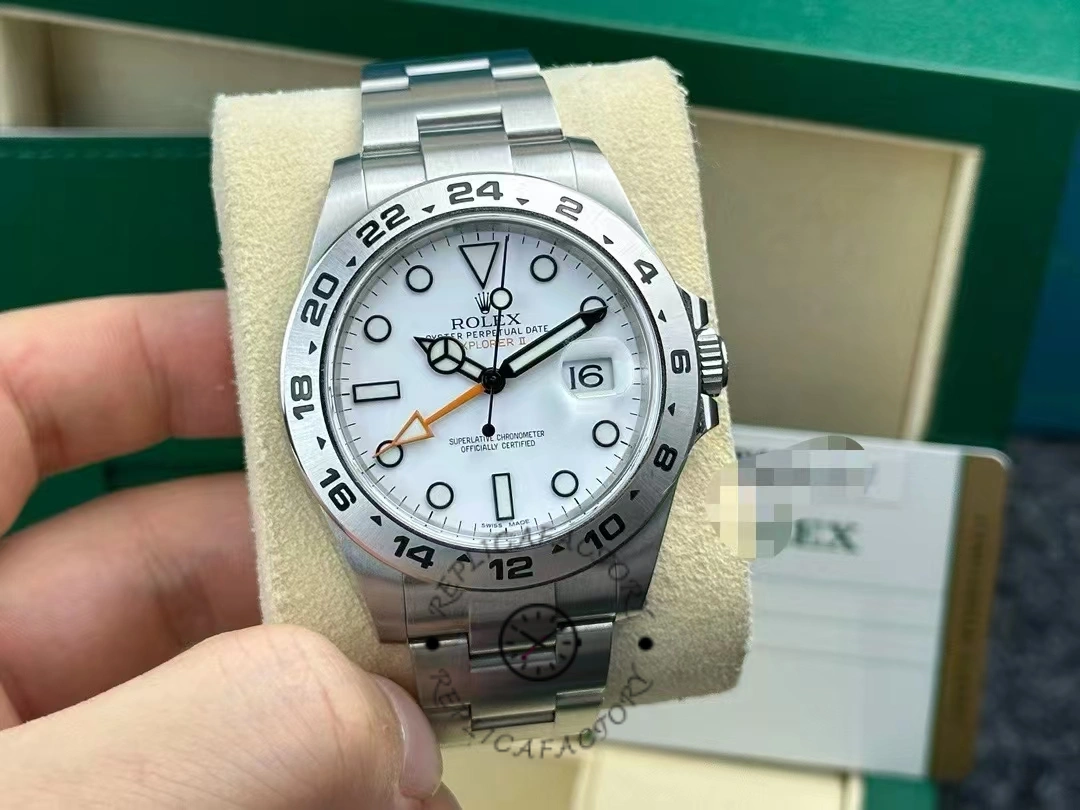 Rolex Explorer II m226570 0001 on cushion with box, white dial and fixed 24-hour bezel visible.