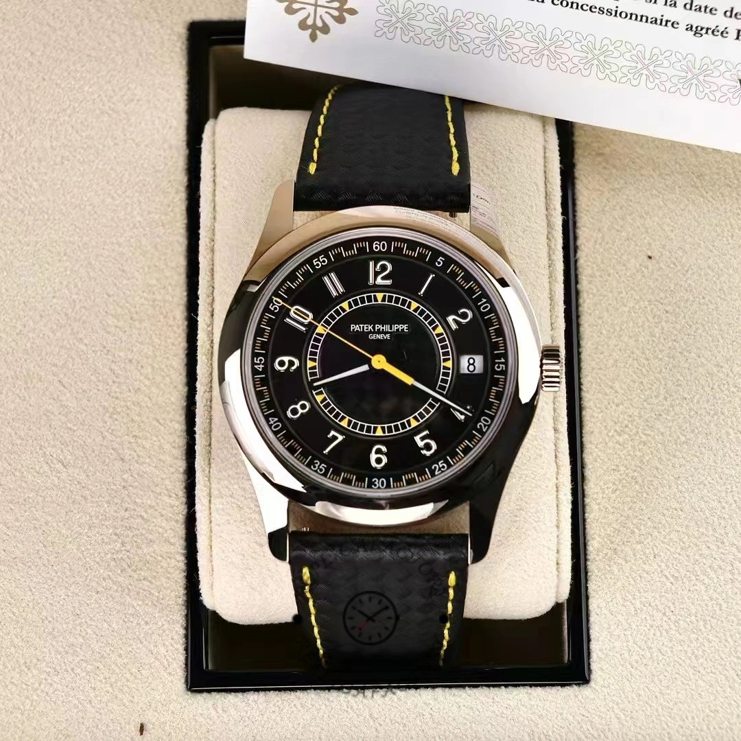 Patek Philippe Calatrava 6007G-001 laid in a box, highlighting the black dial and yellow minute track.