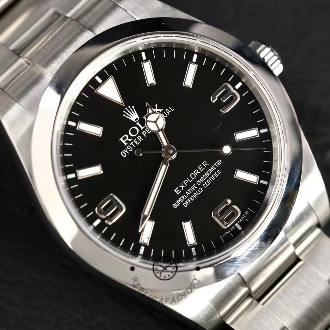Rolex Explorer 214270 dial close-up, black dial with 3-6-9 numerals, smooth bezel.